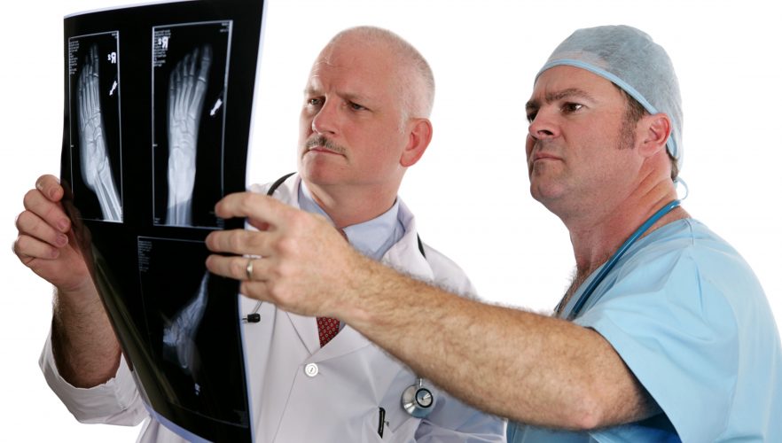 Doctors examining a podiatry x-ray result